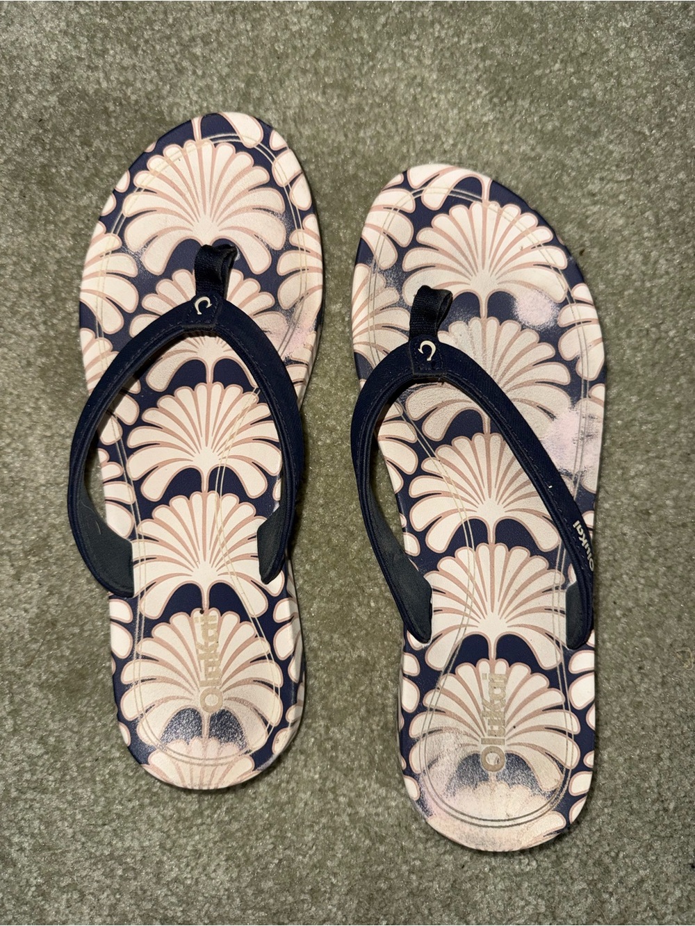Blue and white flip flops